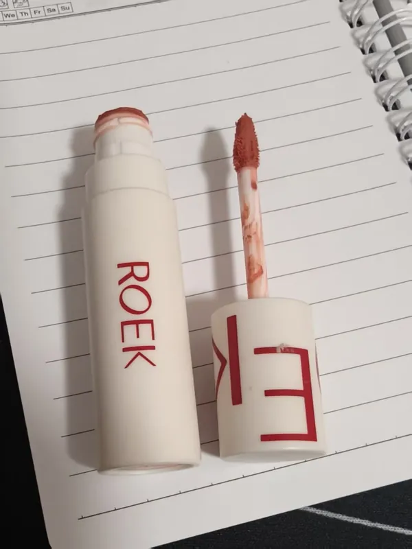 Lipstick photo with a cluttered background